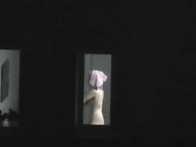 Ночные съемки голых женщин через окно